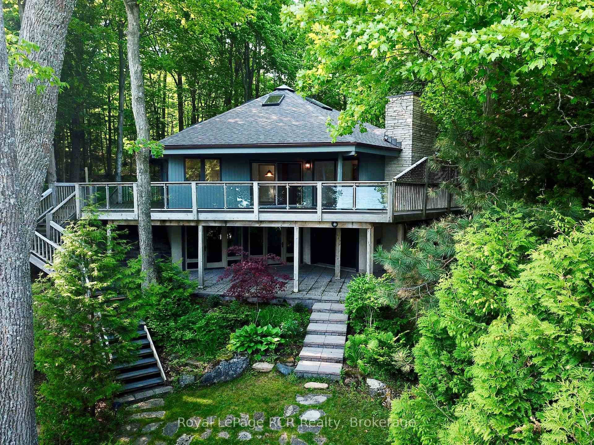 Architecturally UNIQUE, custom 4 SEASON WATERFRONT PROPERTY in EXCLUSIVE JACKSON COVE on Georgian Bay.