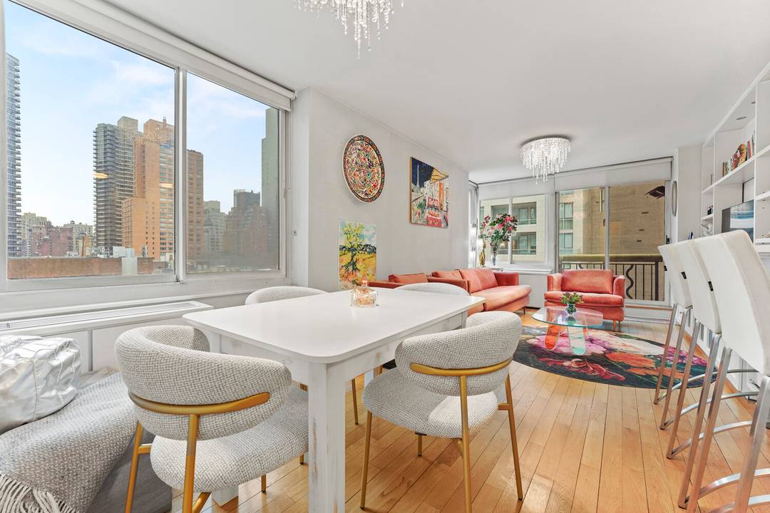 Welcome to the rarely available B line at Evans View Condominium a sun drenched corner residence offering sweeping open city views and refined Upper East Side living.