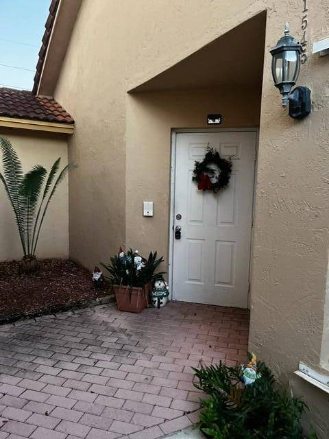 Wonderful 2 bedroom, 2 bathroom townhome at Lakes by the Bay in Windy Pointe in desirable Cutler Bay.
