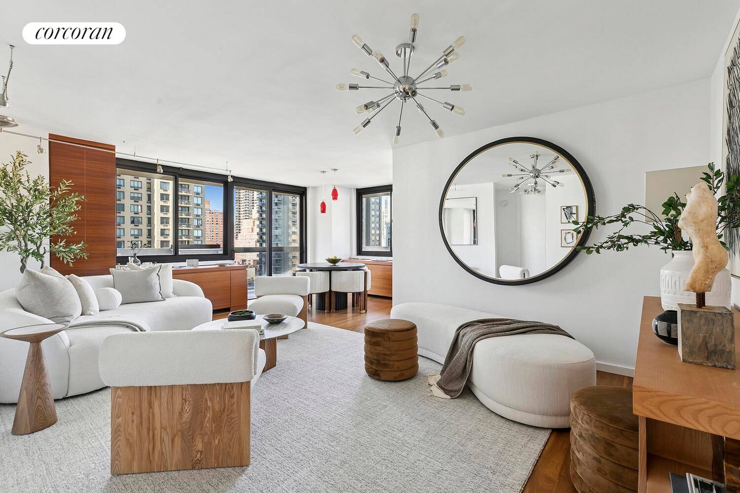 Fantastic corner two bedroom, two bath residence featuring a 33 foot wraparound terrace and abundant natural light throughout.