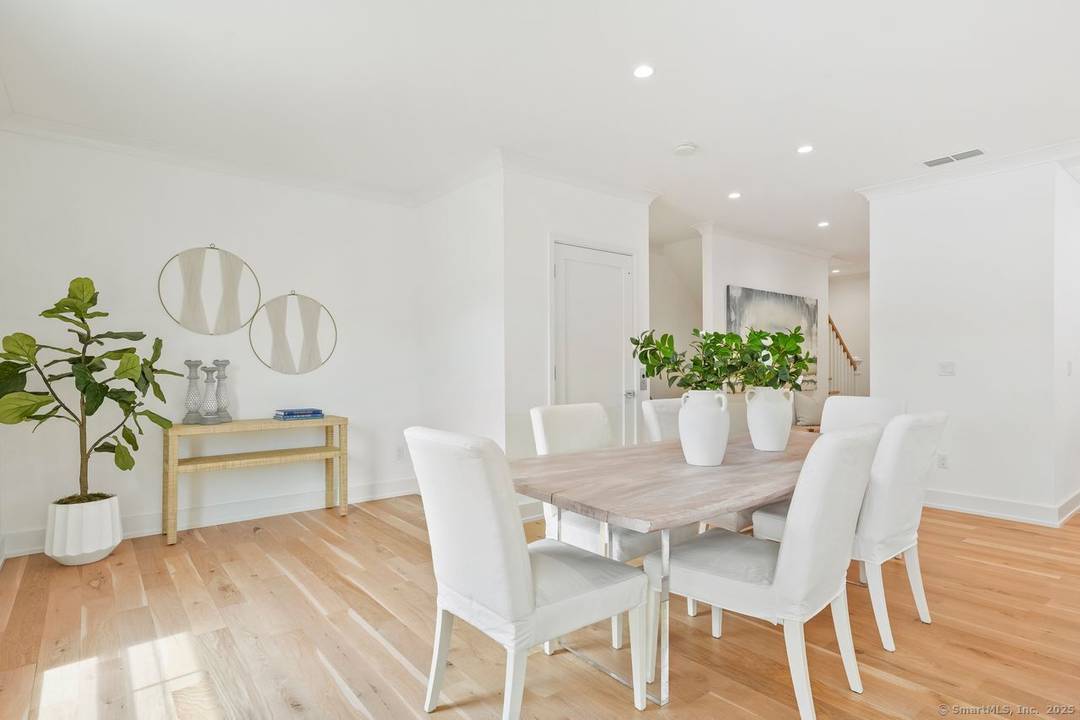 Approximately 4, 000 square feet townhouse feels like a single family home with thoughtfully designed living space and featuring four bedrooms, four en suite bathrooms, and two half baths, and ...