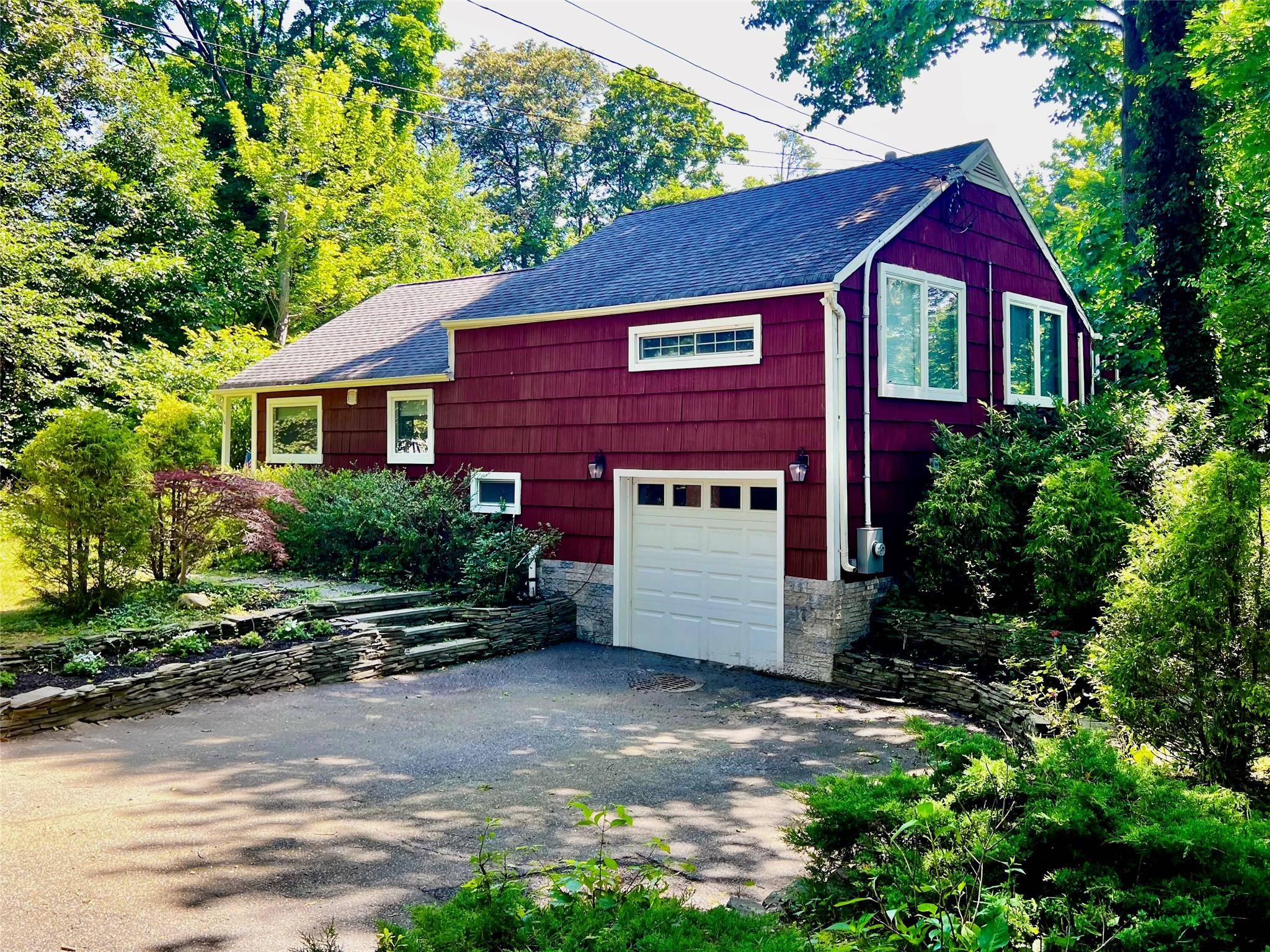 Expanded And Renovated, 14 Suydam Drive Is A Split Level Style Home Located In The Desirable Rollingwood Area of Melville.
