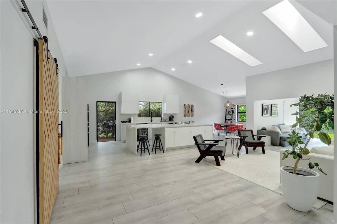 Welcome to your fully renovated retreat in Waterside, an exclusive gated community in the heart of East Boca Raton.