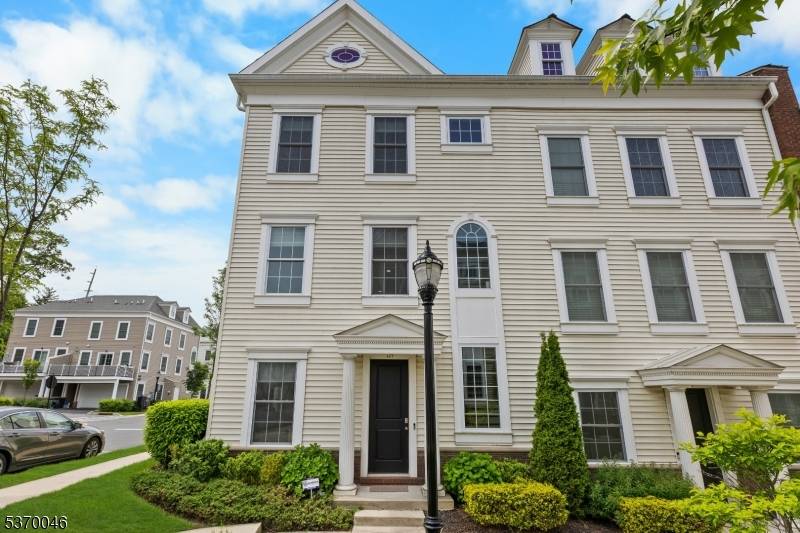 Welcome to FINEST sought after Colonial Style Luxury townhome in Wright Place Community of Wood Ridge ; End Unit, North East Facing home with a lot of updates.