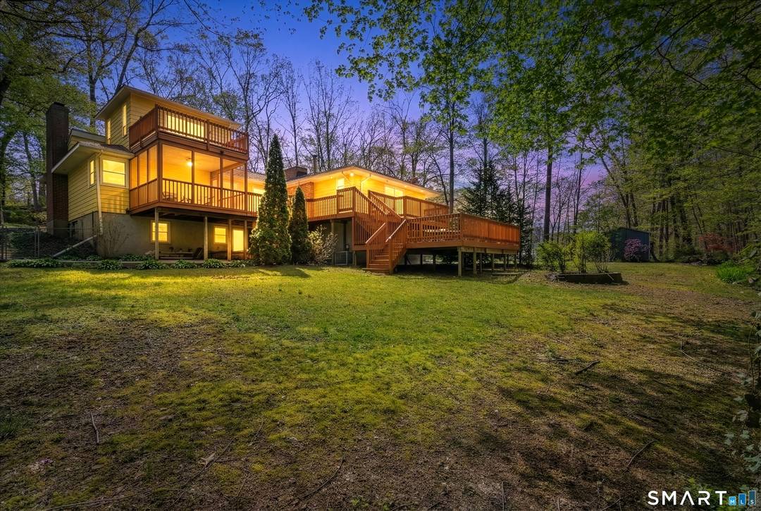 Sun filled 3 bedroom, 3 full bath residence in Guilford's sought after West Lake community, designed for exceptional indoor outdoor living.