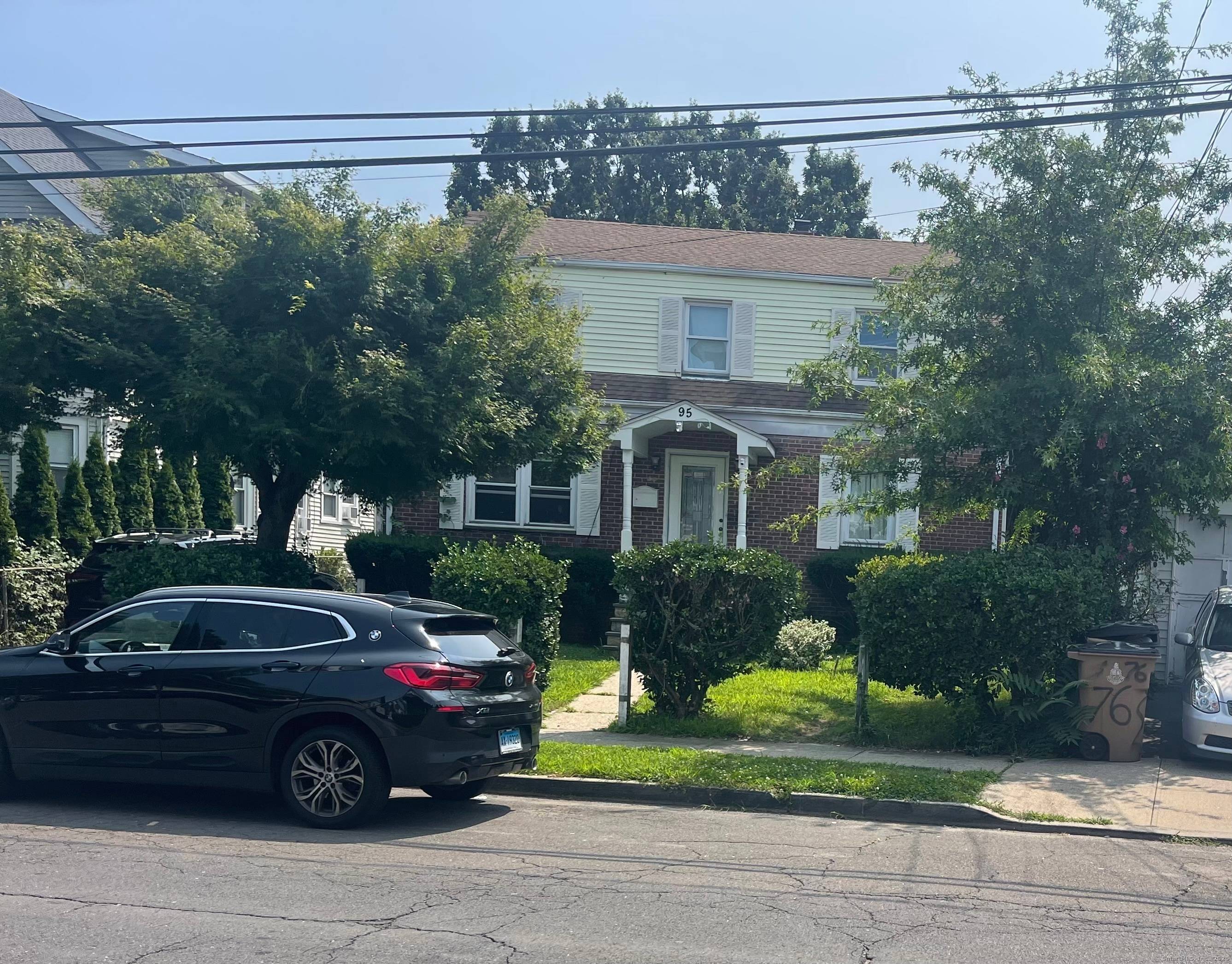 Take notice ! Legal two family dwelling in sought after Cove section of Stamford.
