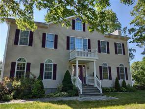 Rare find of a spacious, open bright colonial in exceptionally convenient location !