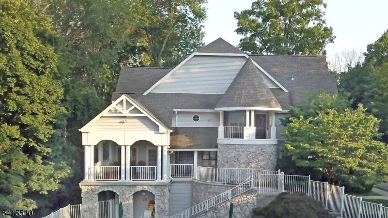 Beautiful ground level corner unit offering true one floor living with no stairs.