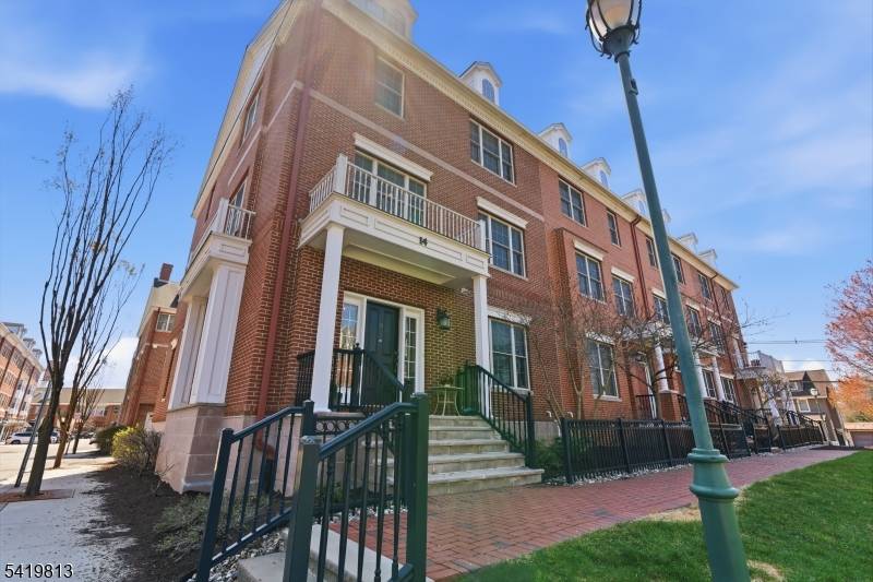 Stunning end unit townhouse in the heart of Livingston Town Center, offering 3 bedrooms, 2 full and 2 half baths.