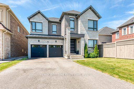 Welcome to 19 Raindrop Terrace an exceptional 5 bedroom, 5 bathroom, 4073 sq ft above ground home backing onto a serene ravine in one of Brampton's most sought after neighborhood.