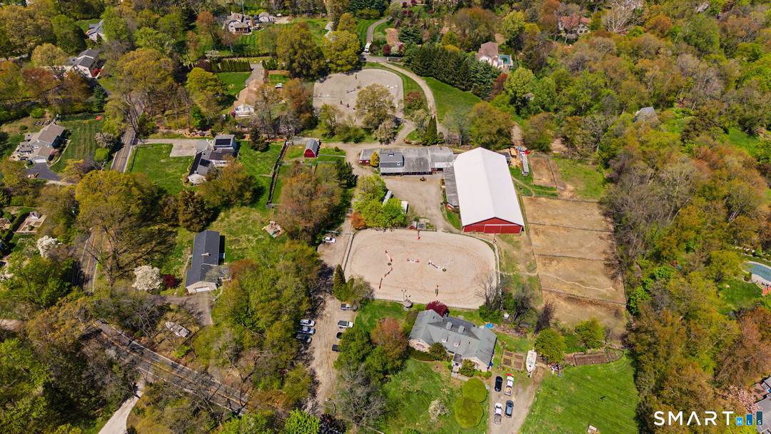 A rare opportunity to acquire Silvermine Farm, a fully integrated, professional grade equestrian facility spanning two contiguous parcels at 80 90 Comstock Hill.