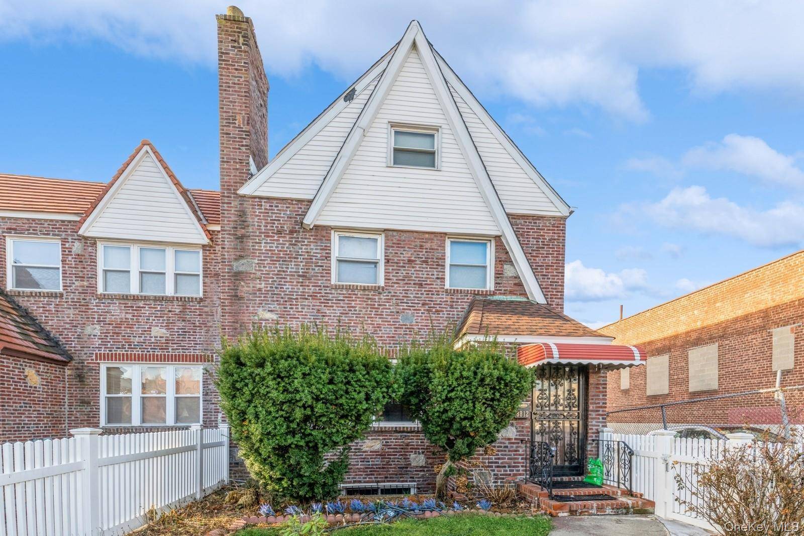 One of a kind Brick Single family Colonial in Queens Village.