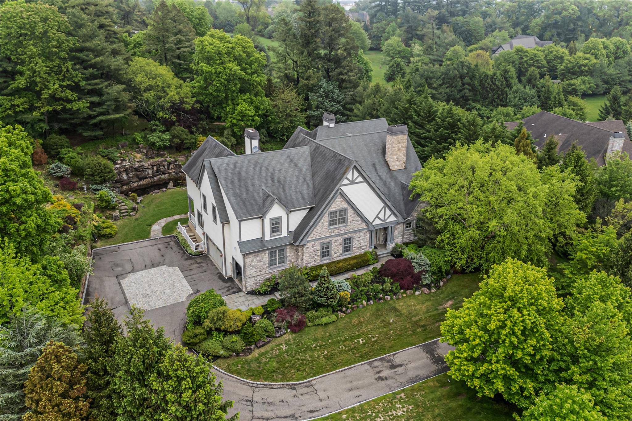Nestled within an exclusive private HOA community, this luxurious estate constructed in 2007 offers the perfect blend of grandeur, privacy, and modern comfort.