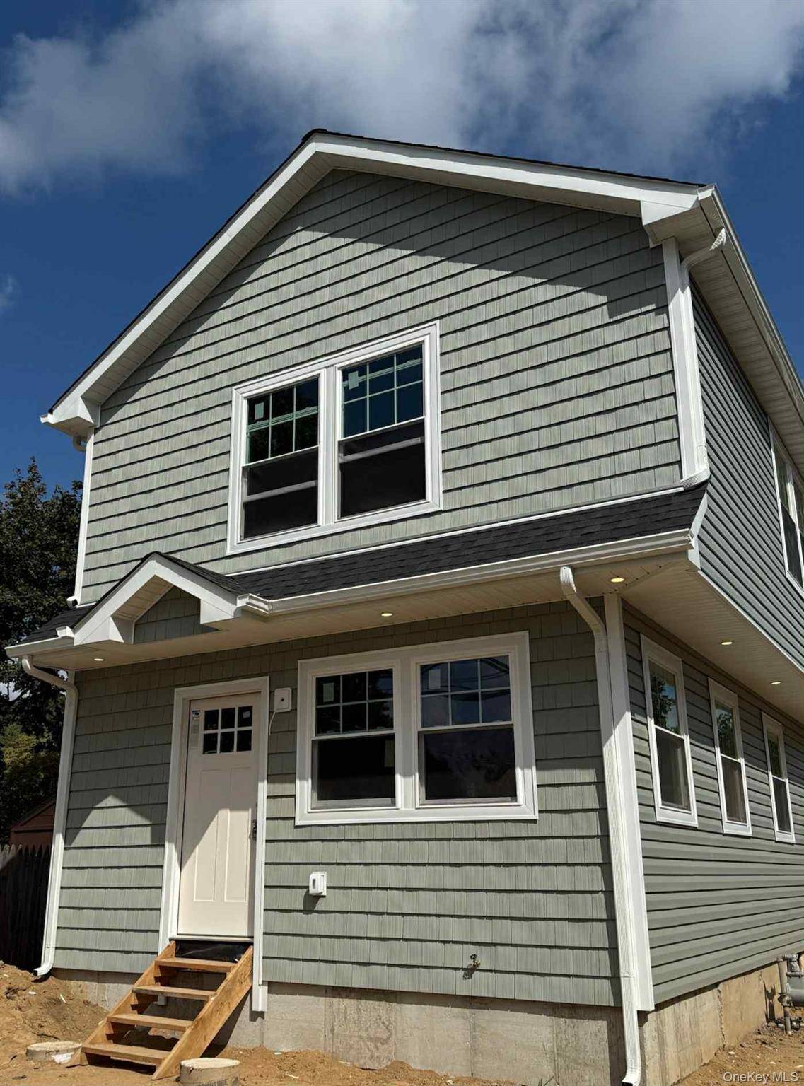 All Brand New Colonial featuring Custom White Shaker Cabinets, Quartz Counter Tops, SS Appliances, Tile Backsplash, 2 brand new baths, Oak Hardwood Floors Throughout, Hi Hats, All New Framing, Sheetrock, ...