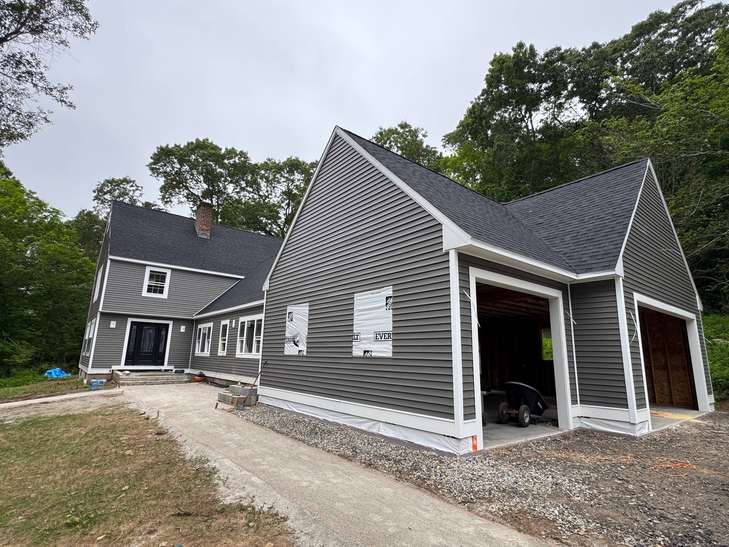 Nestled along a peaceful country road, this stunning 5 bedroom, 4 bath Colonial offers over 4, 600 square feet of living space with hardwood floors throughout and beautifully tiled bathrooms.