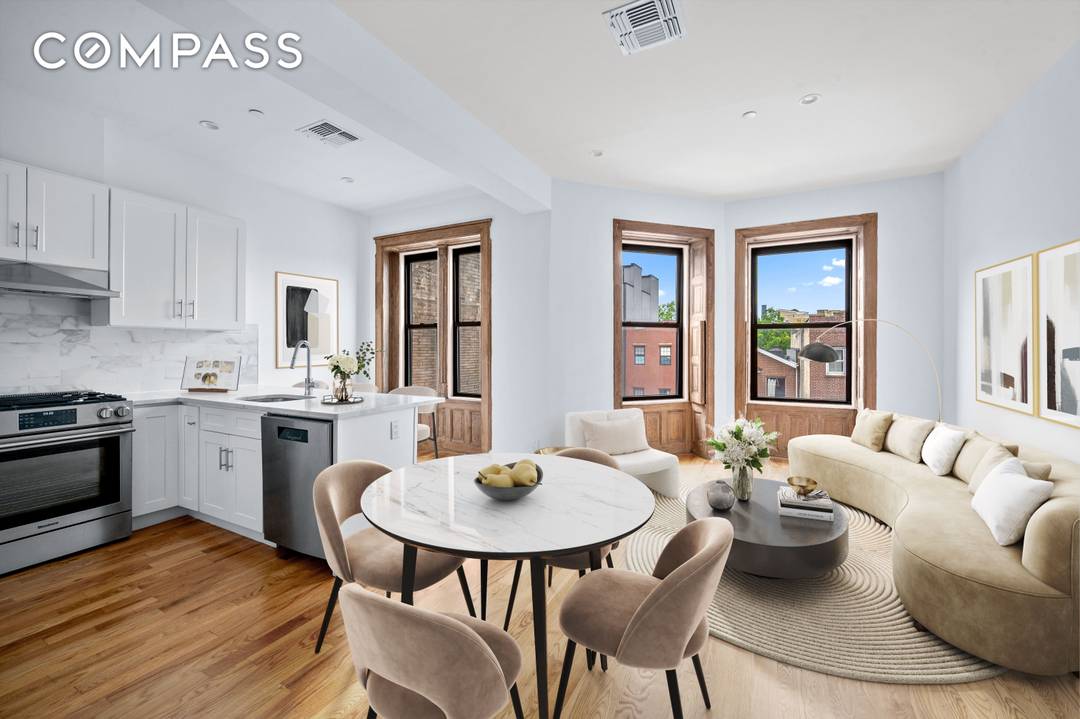 Welcome to 257 Throop Ave, a charming condo nestled within a classic Brooklyn limestone.