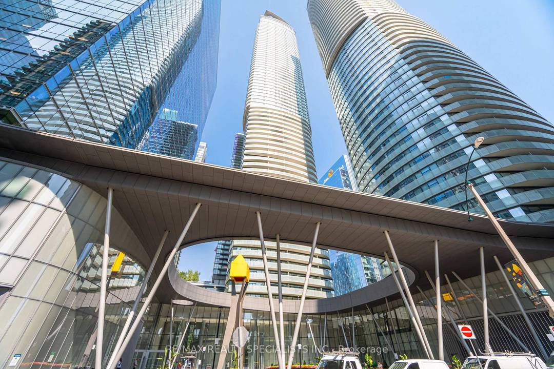 Welcome to 12 York Street, Stunning 3 bedroom den, corner suite condo boasting a spacious 1, 091 sq ft open concept layout with breathtaking city and partial Lake Ontario views.