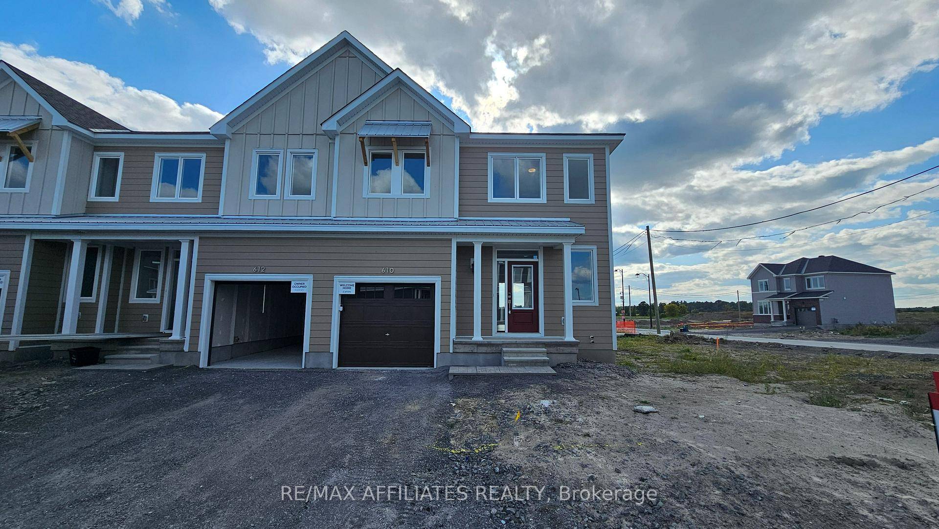 Neat, bright, and beautifully designed, this newly built Caivan Plan 4C end unit townhome proudly occupies a true street corner in the growing family community of The Ridge in Richmond.