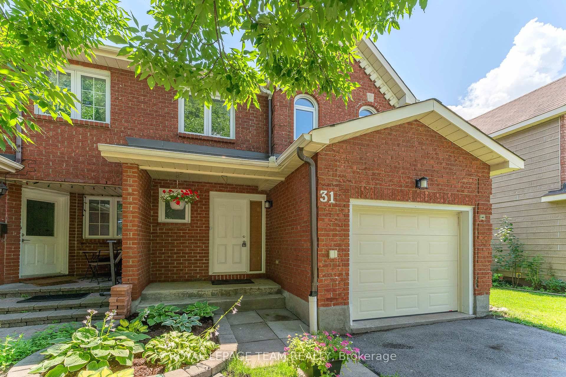 Tucked away in the well established neighbourhood of Katimavik, this 3 bed, 3 bath end unit townhome boasts no rear neighbours and just steps from schools.