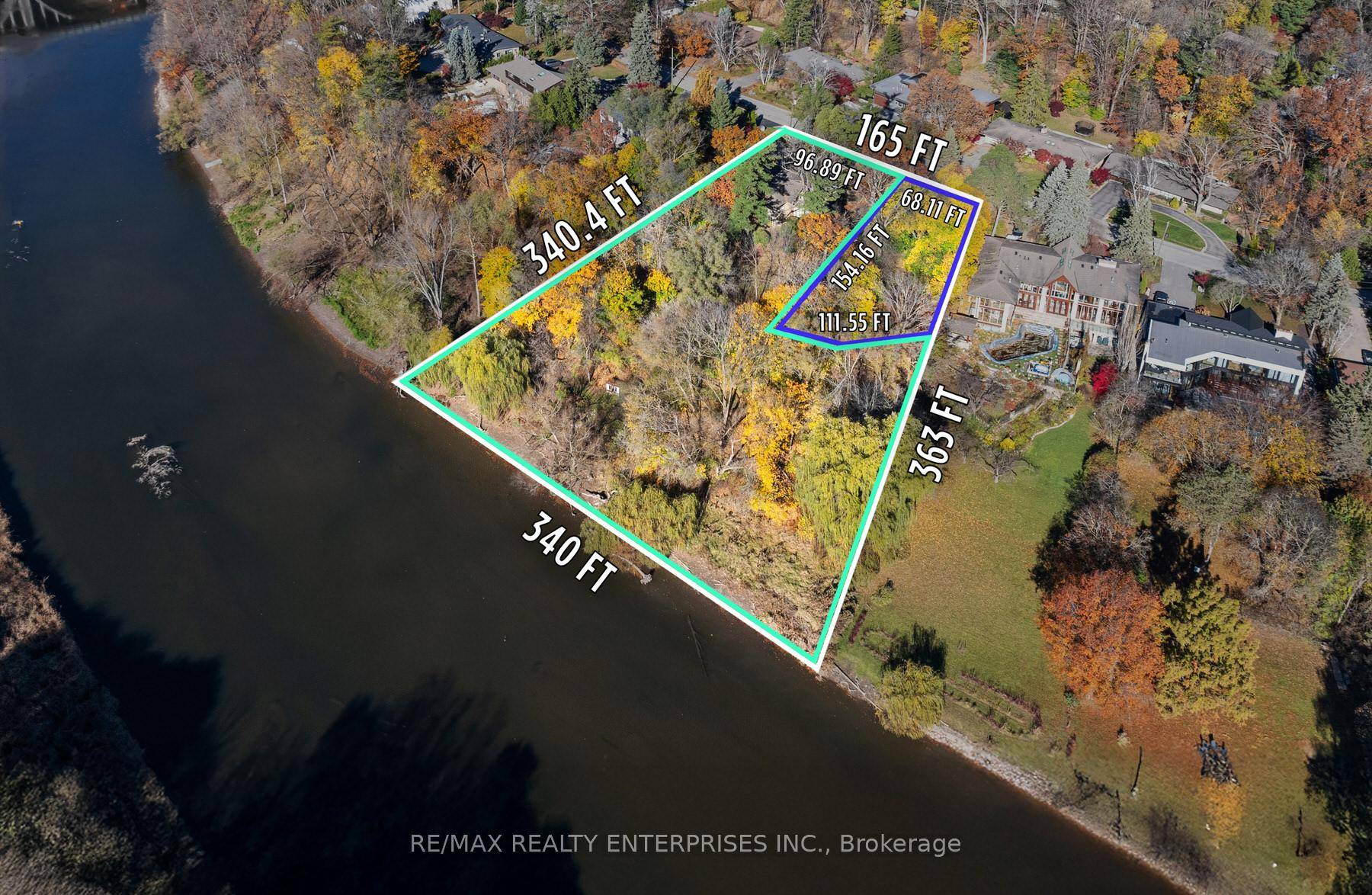 Welcome To An Iconic And Rare Estate Nestled On Nearly 2 Acres Of Lush, Tree Lined Grounds, Offering An Extraordinary 340 Feet Of Private Credit River Frontage.
