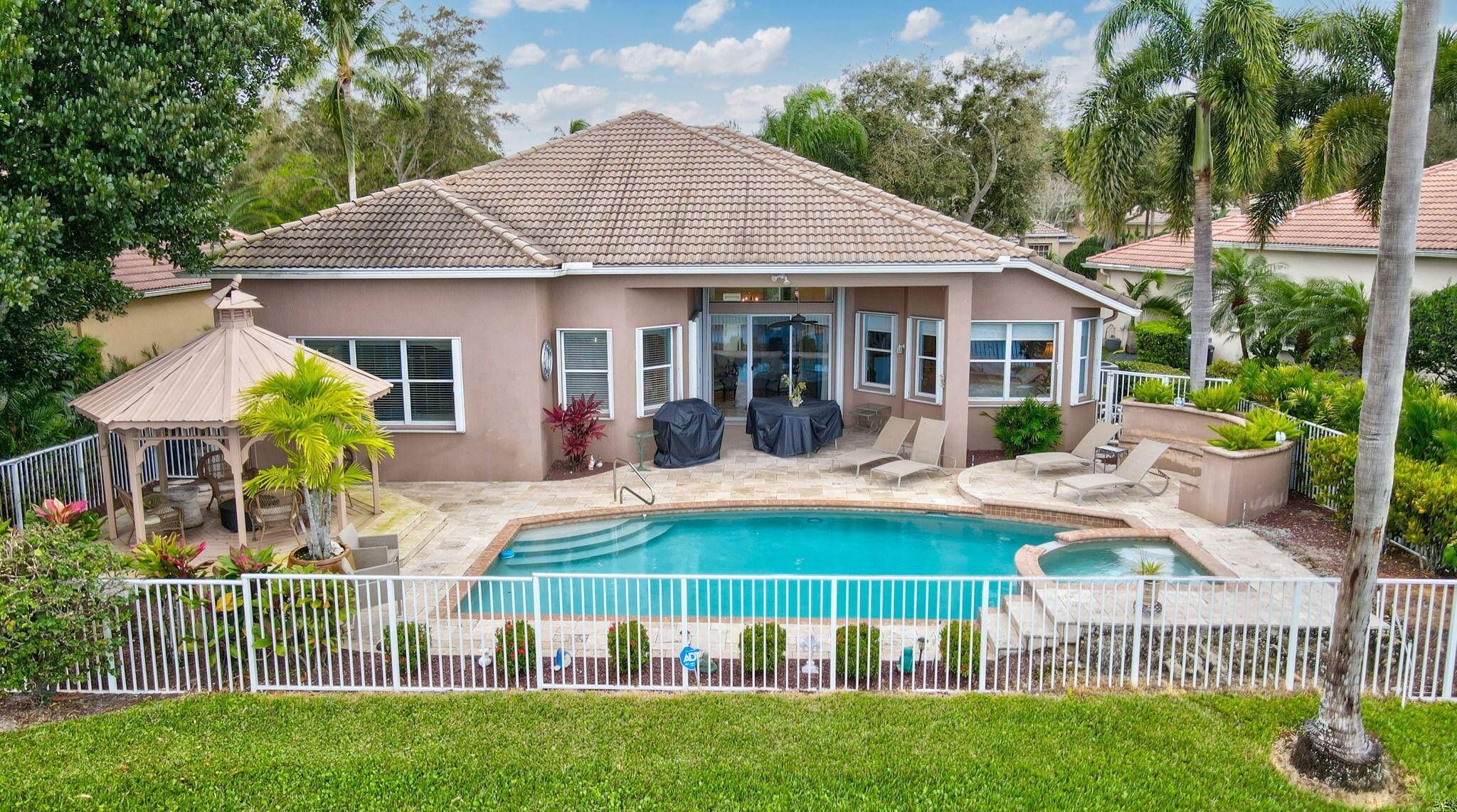 Impeccably maintained pool home with beautiful lake views !