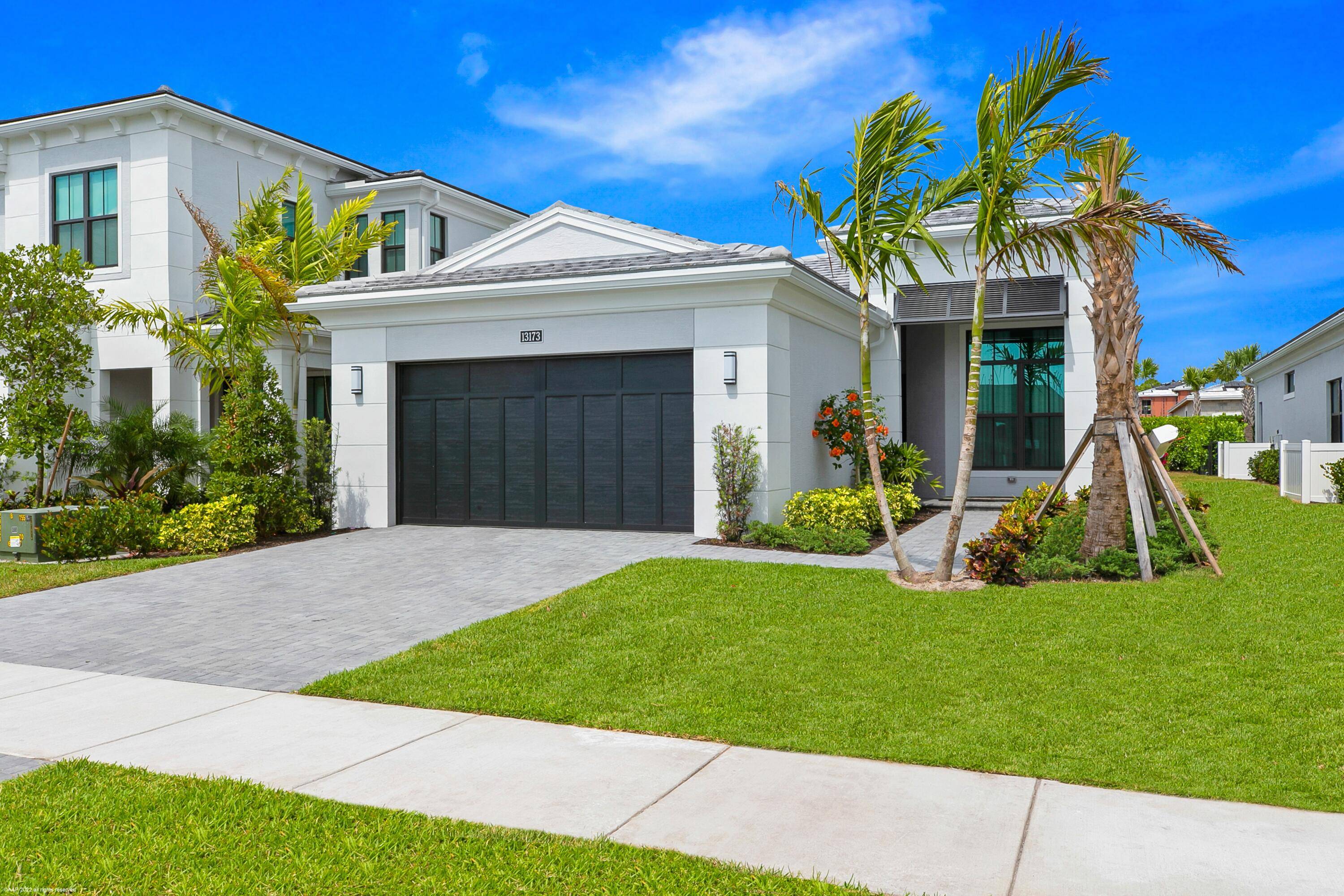 Beautifully appointed 4 bedroom, 3 bathroom Degas floor plan nestled in the coveted community of Artistry at Palm Beach Gardens.