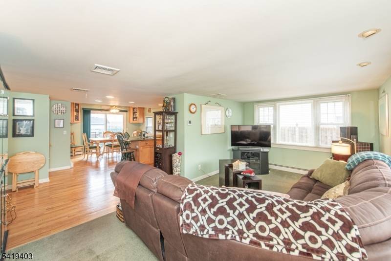 Move in ready 4 bedroom, 2 bath Colonial located in desirable Lake Parsippany.