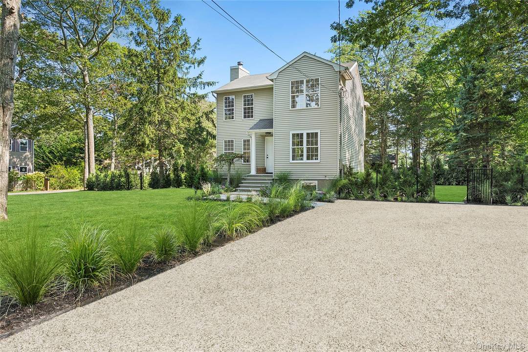 Experience Hamptons luxury in this beautifully renovated, practically new construction retreat on Shore Road.