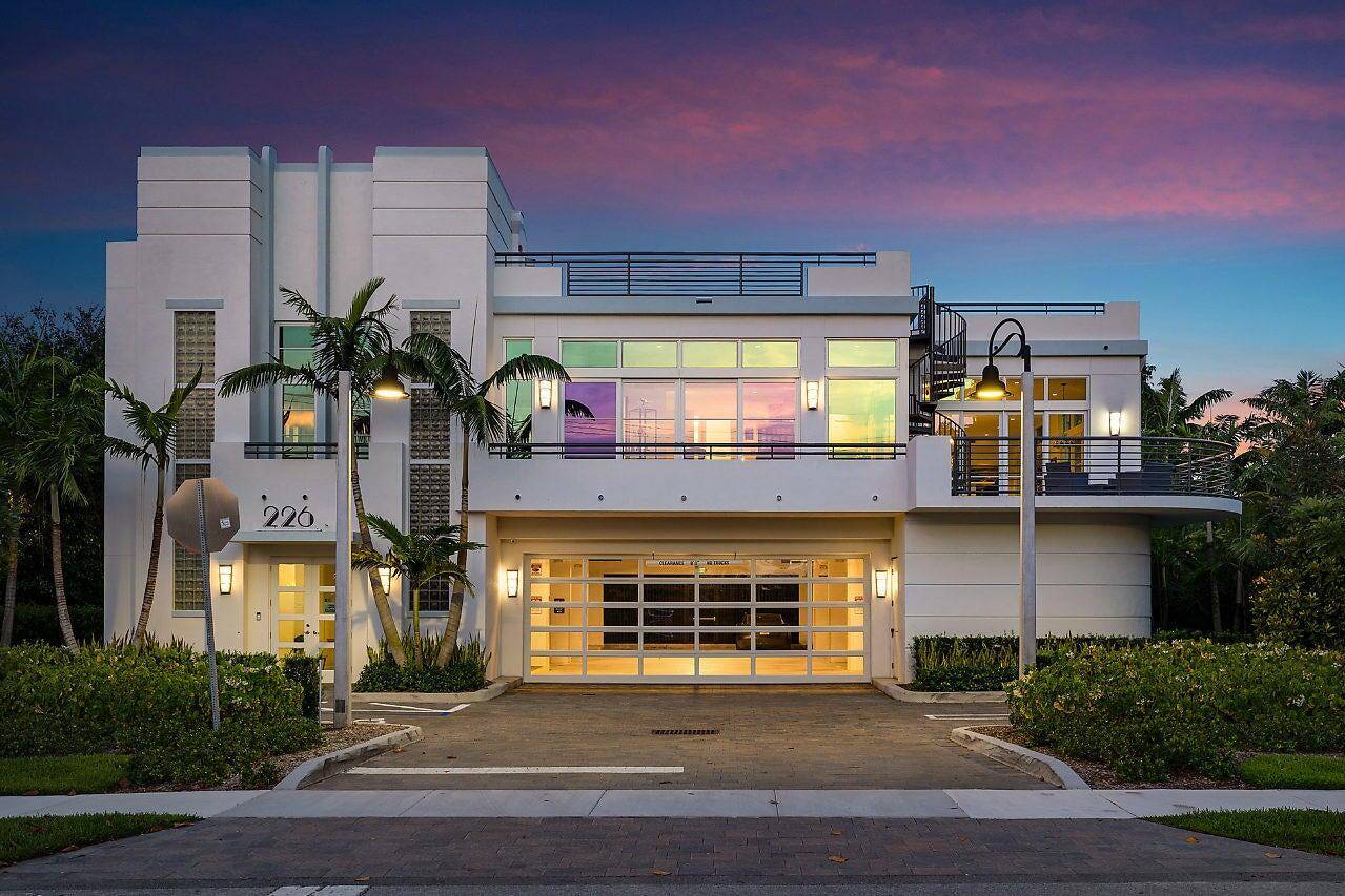 Contemporary Art Deco free standing building offering true live work flexibility near beach downtown.