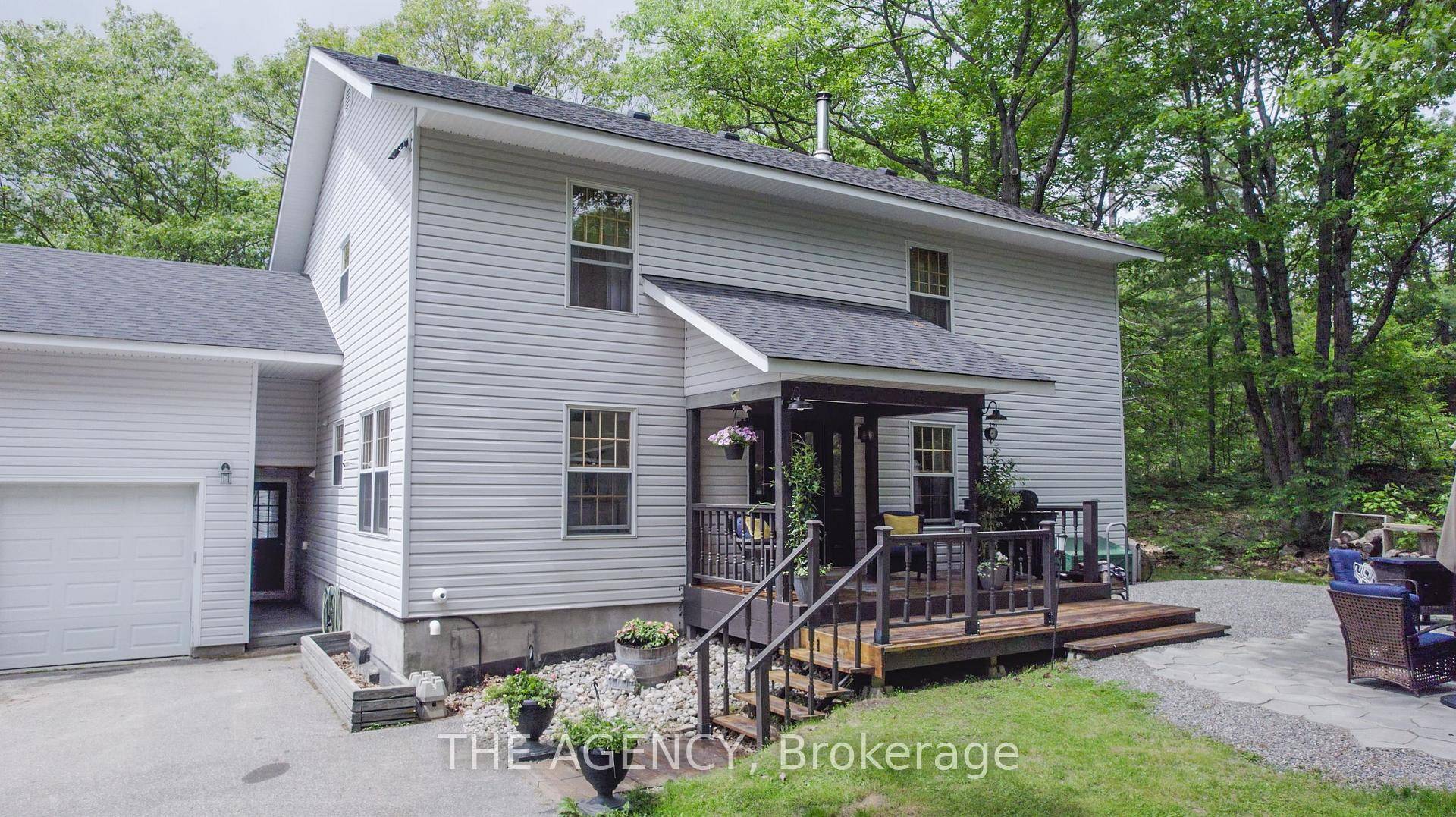 Perched in a private, forested setting just minutes from the highly desired Macaulay Public School in Bracebridge.
