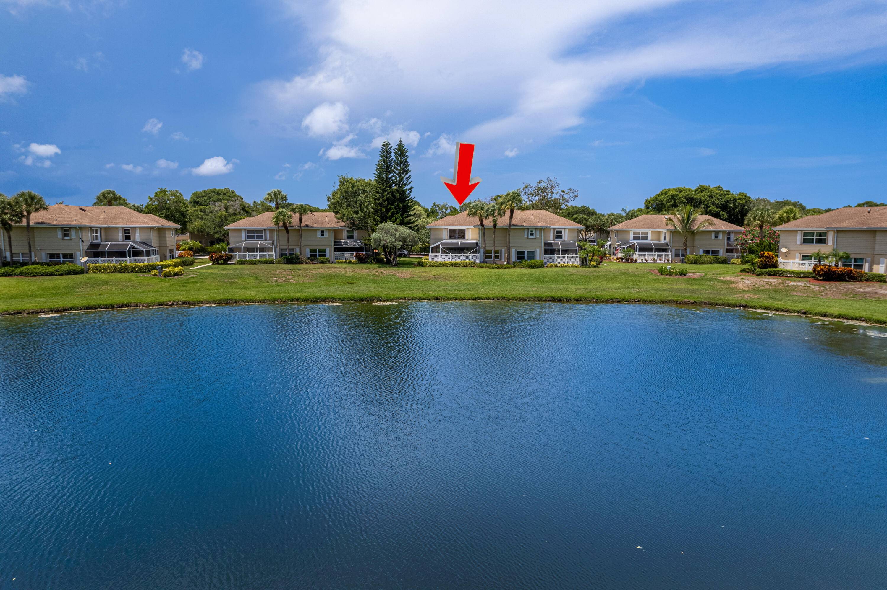 Tastefully and professionally redone, this townhome offers stunning lake views and is located in a desirable gated community.
