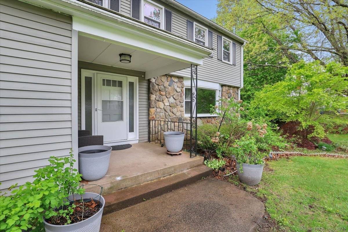 This 4 bedroom, 2 1 2 bath Colonial is move in ready !