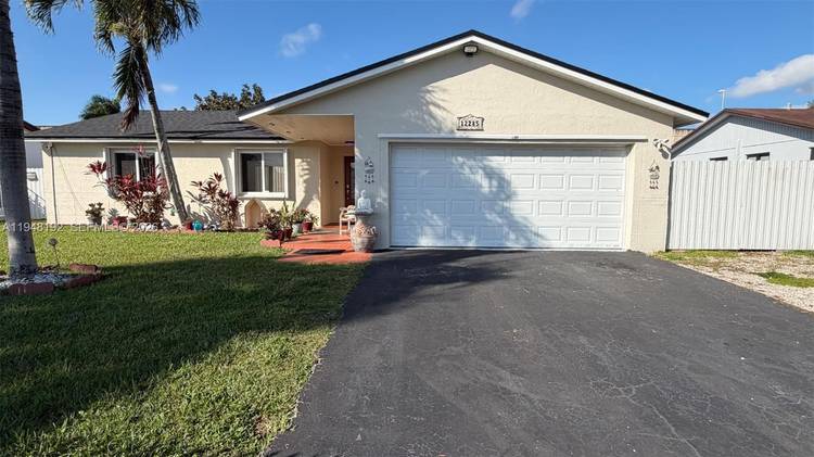 Beautifully updated 3 Bedroom, 2 Bath Home with spacious backyard and modern features.