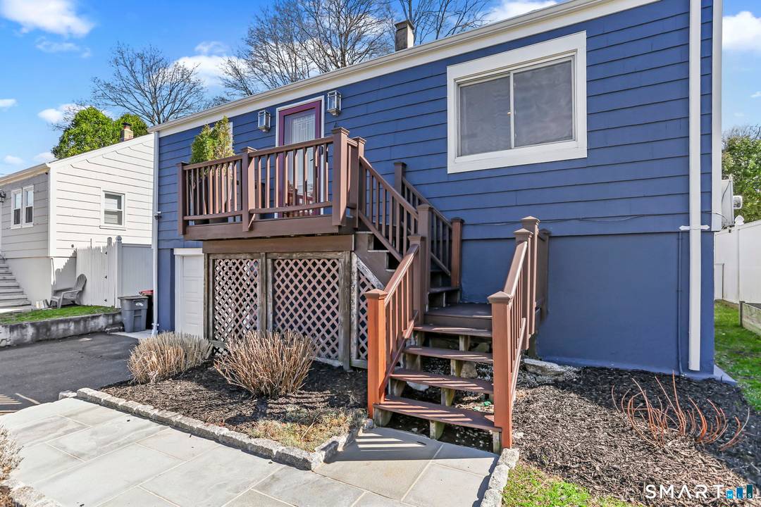 Welcome to 6 Wildmere Lane, a thoughtfully renovated 3 bedroom, 3 bath Cape in a quiet Norwalk neighborhood close to everything.
