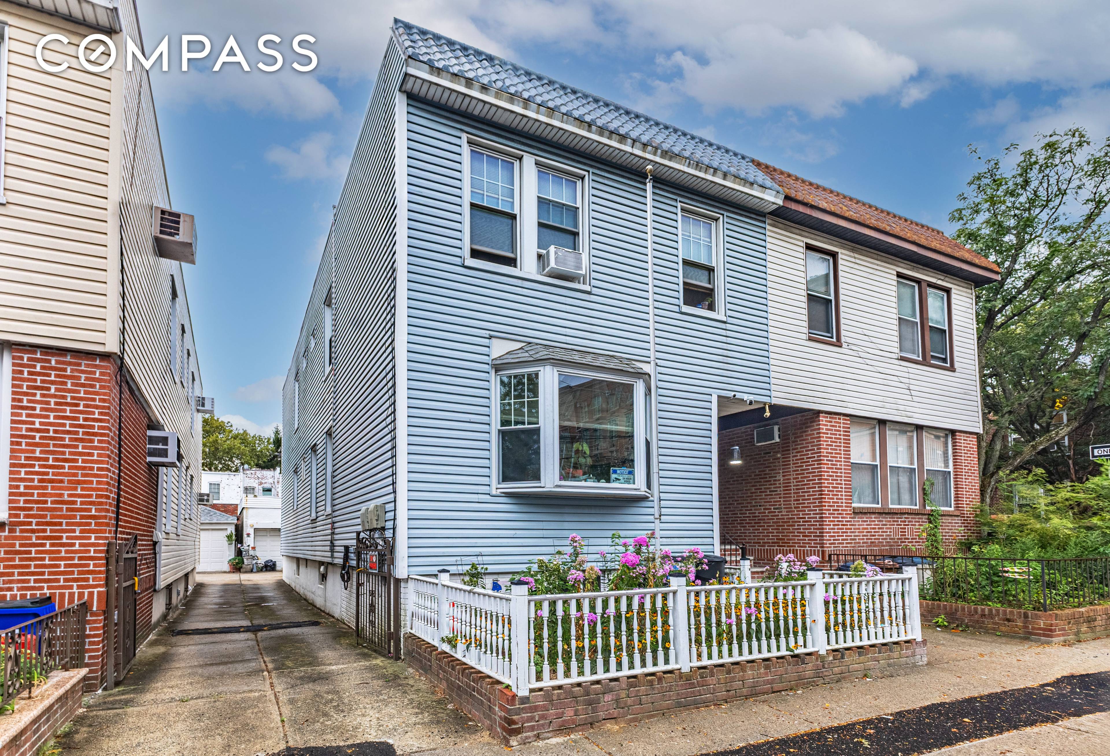 Welcome to This Beautiful 3 Family Home in the Heart of Maspeth !