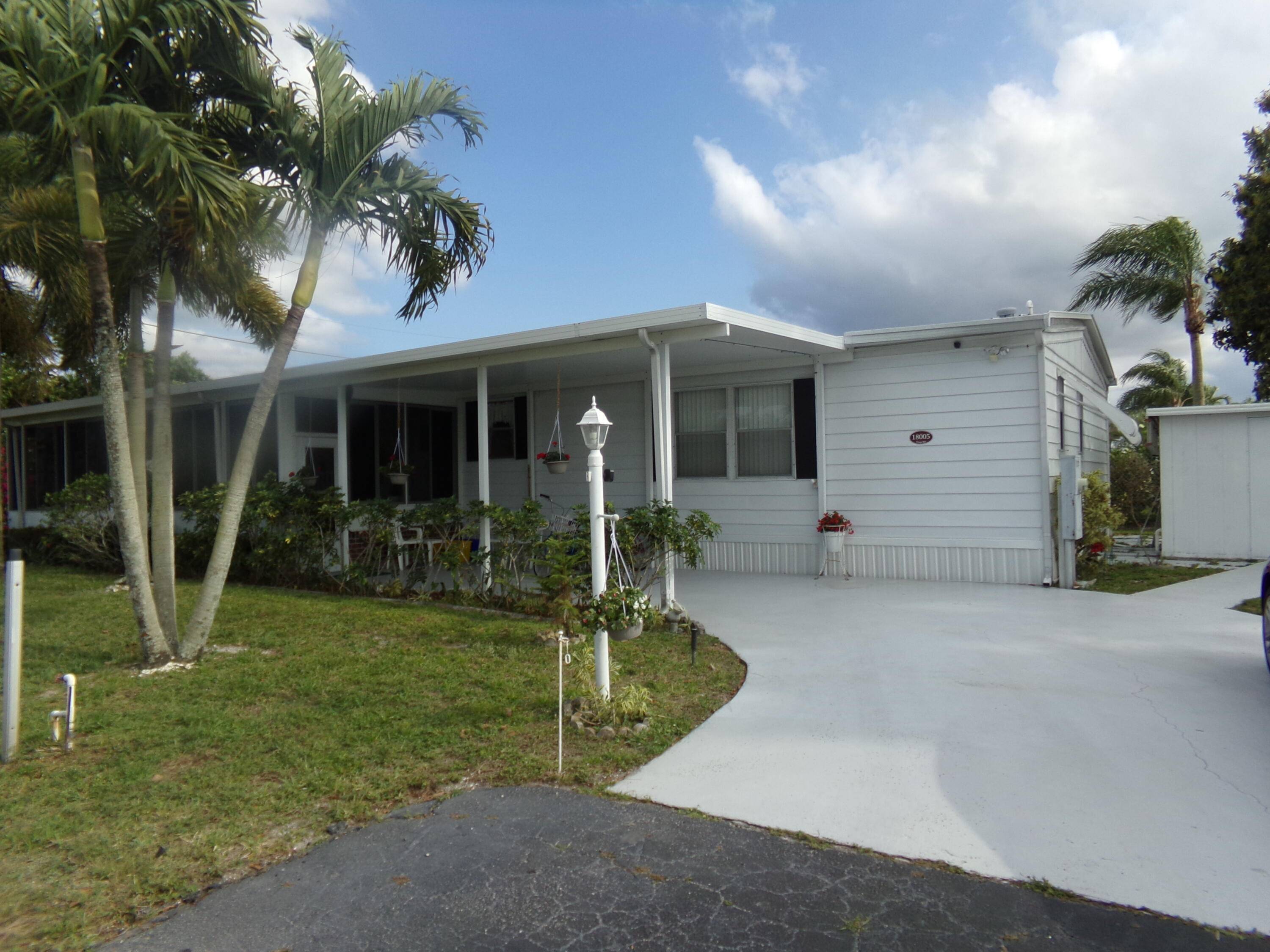 Very well maintained home with beautiful landscape located in the desirable Jamaica Bay community in Boynton Beach.