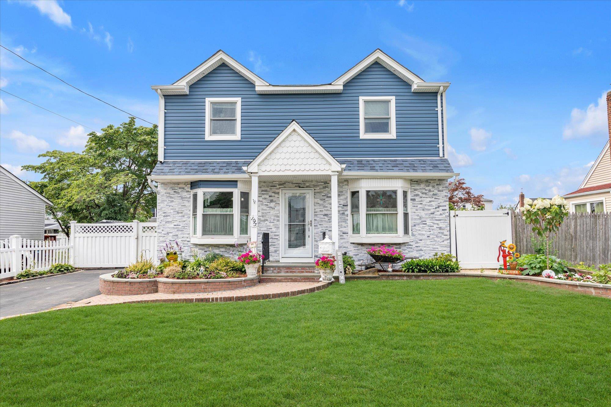 Welcome to 1015 Grand Blvd, a beautifully maintained and thoughtfully updated Colonial located in the highly desirable Salisbury section of Westbury, within the East Meadow School District.