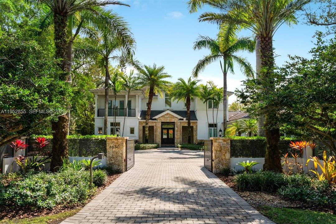 Set on a gated 31, 798 SF lot in the heart of Pinecrest, this impressive 6BD 7.