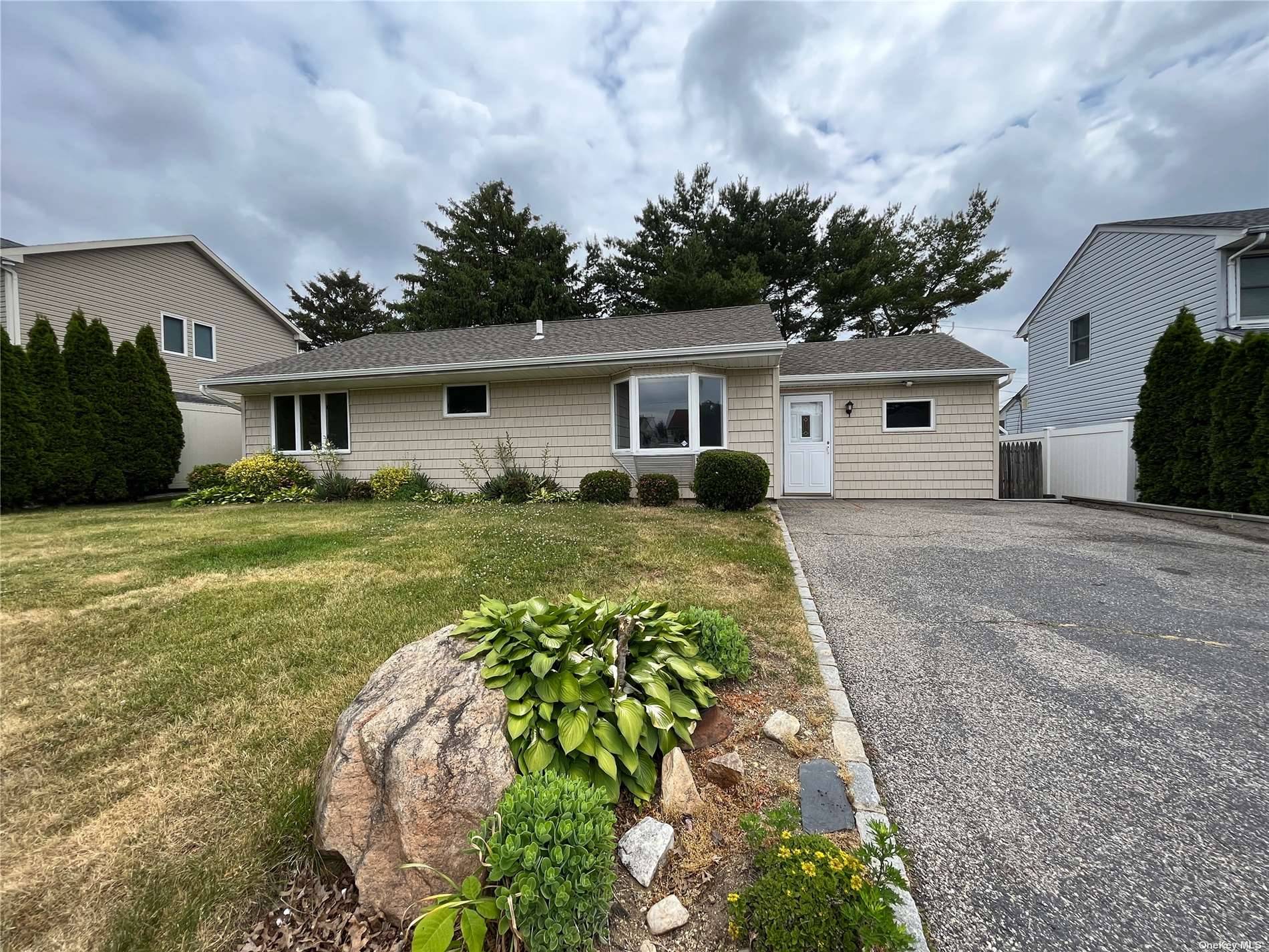 Updated Ranch, Eik, Large Living Room w Wood Burning Fireplace, 3 Bedrooms, Full Bath, Laundry Room, Utilities amp ; Storage.