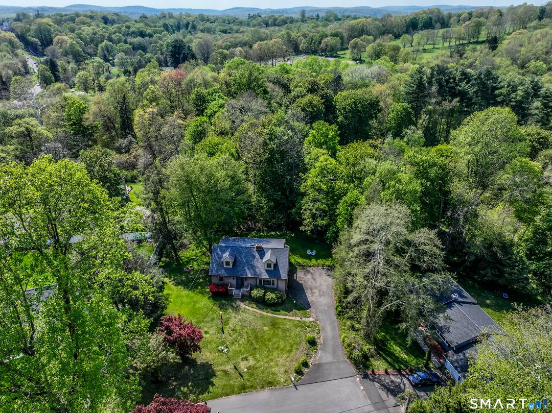 Set on a picturesque, tree lined cul de sac, this home offers the perfect blend of character versatility.