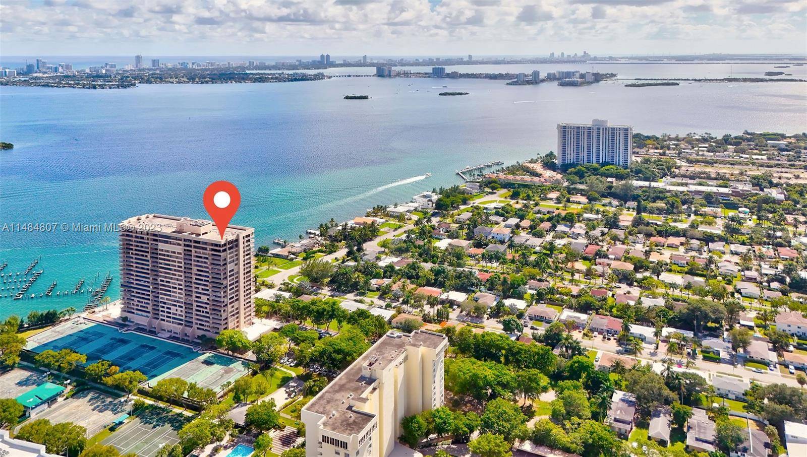Two story corner Penthouse with 20' ceilings and two balconies offering views of Biscayne Bay.