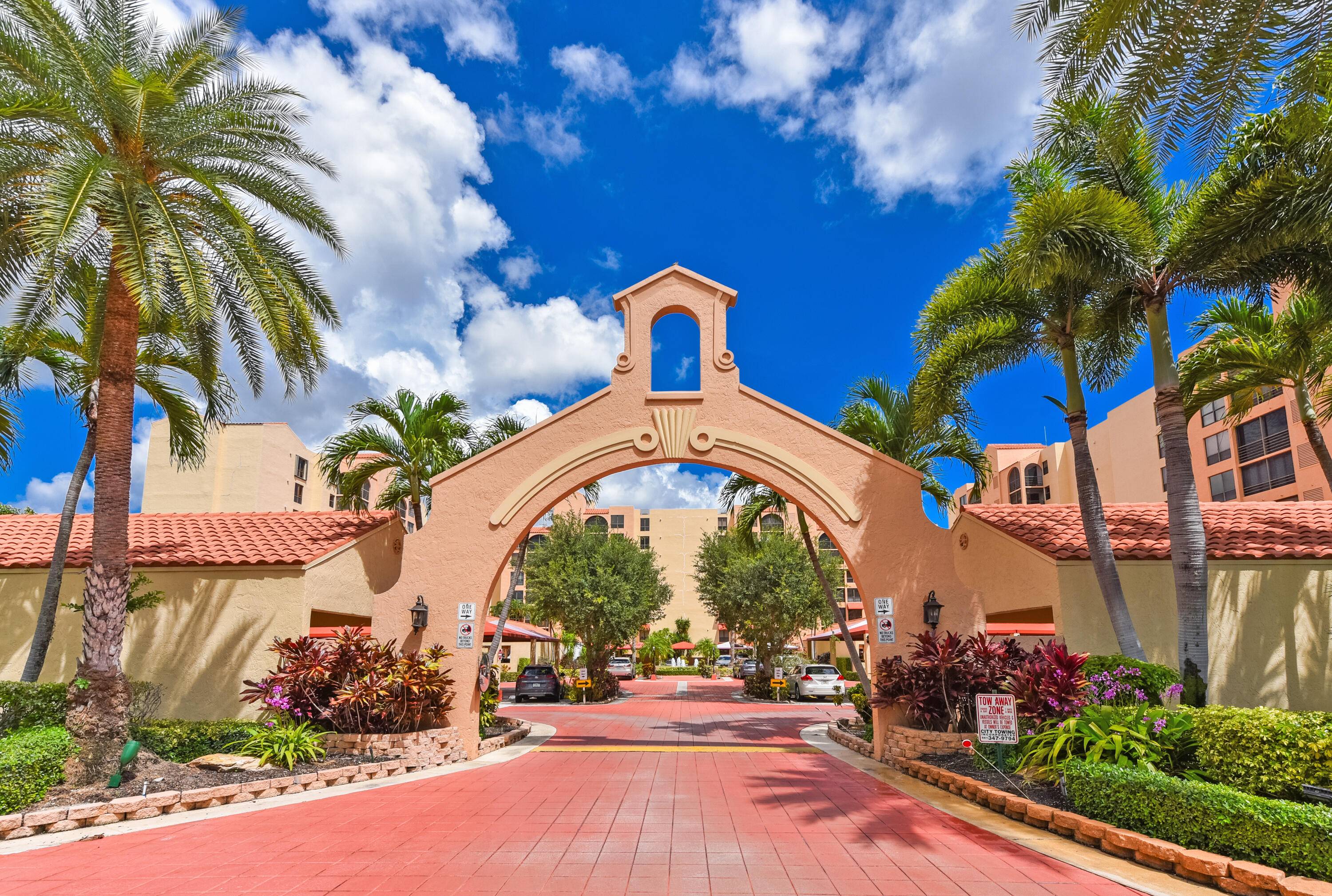 This completely remodeled first floor residence in the Promenade at Boca Pointe offers three bedrooms, two bathrooms, and a spacious open layout filled with natural light.