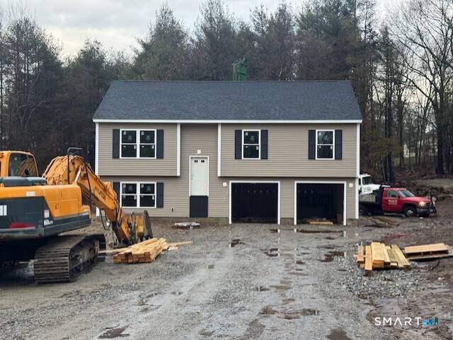 Construction has begun on this New Contemporary Raised Ranch on a Beautiful Wooded Lot.