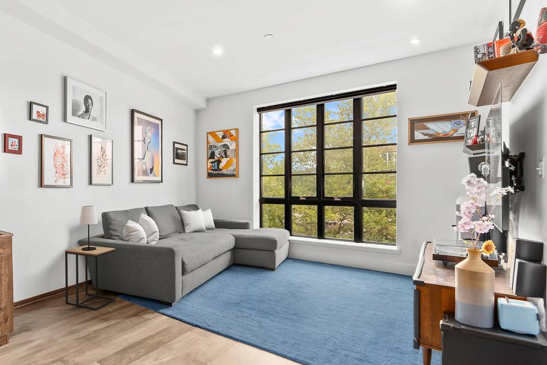 This stunning full floor, three bedroom, two bath top level duplex is crowned with an unmatched private rooftop spanning the entire building.