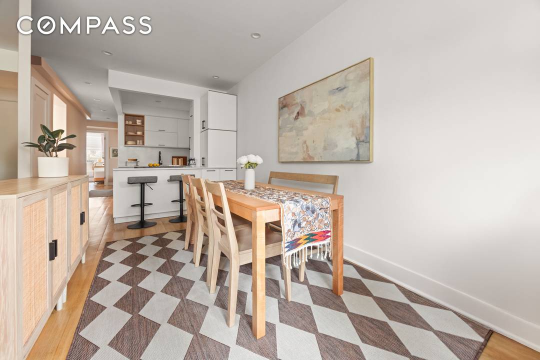 Bright, Elegant Garden Duplex with Private Backyard and Plentiful Storage This garden duplex offers warm, light filled living and dining spaces with charming bay windows and natural finishes throughout.