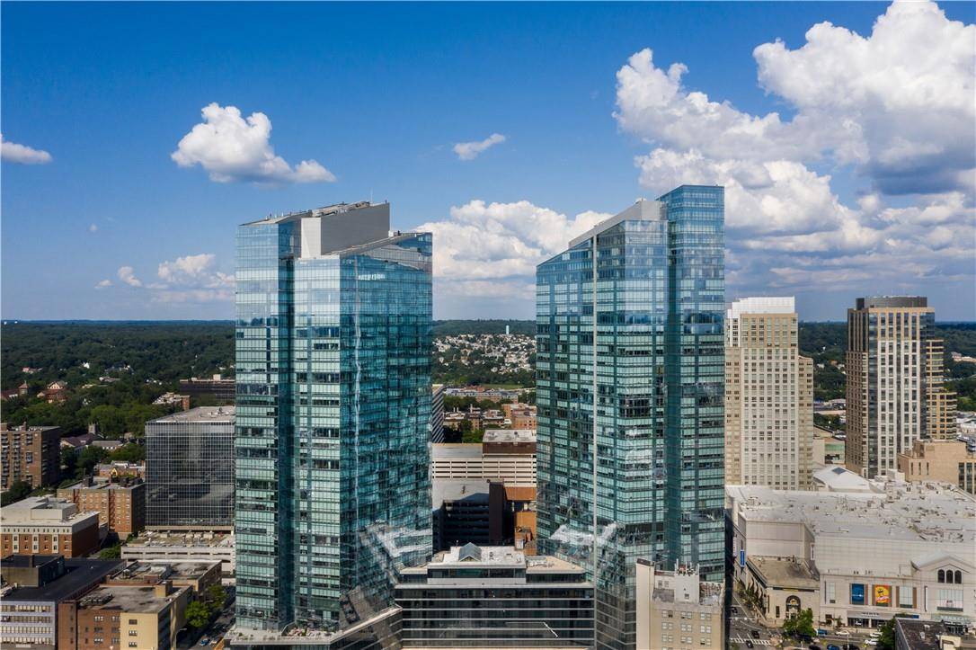 Spacious corner unit with floor to ceiling windows.