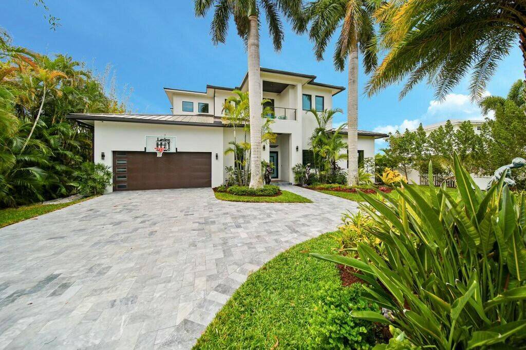 Discover luxury living at its finest in this exquisite 2022 custom built modern home.