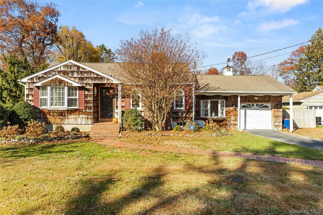 Move right in to this Completely Renovated Huntington Home on Park like Property.