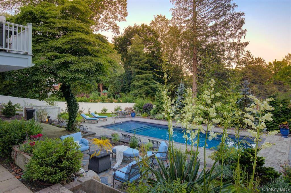 Welcome to this showstopper at 2 Spring Hollow Road an exceptional residence nestled in the heart of Centerport.