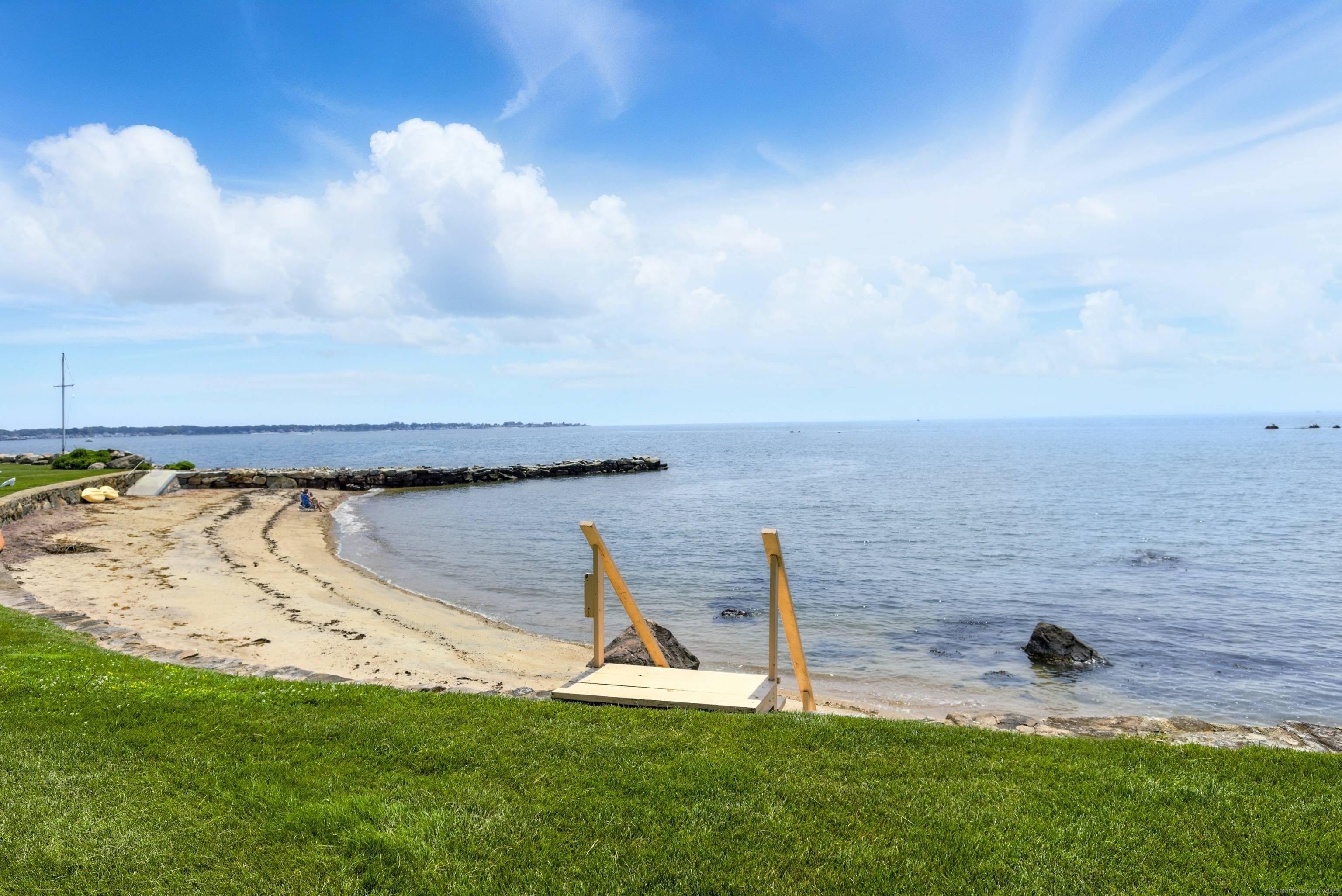 Spectacular Waterfront Home on Long Island Sound Step into a world of timeless elegance at this beautifully updated waterfront cottage, where classic New England charm meets modern comfort.